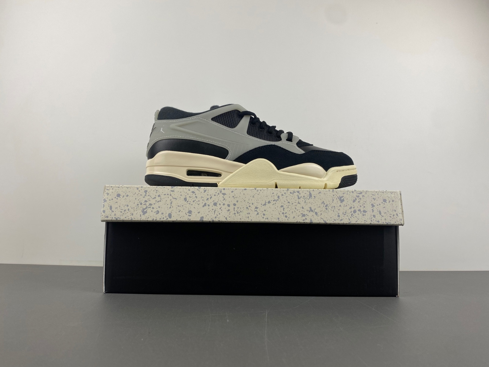 Air Jordan 4 RM GS "Black/Coconut Milk" FQ7939-006