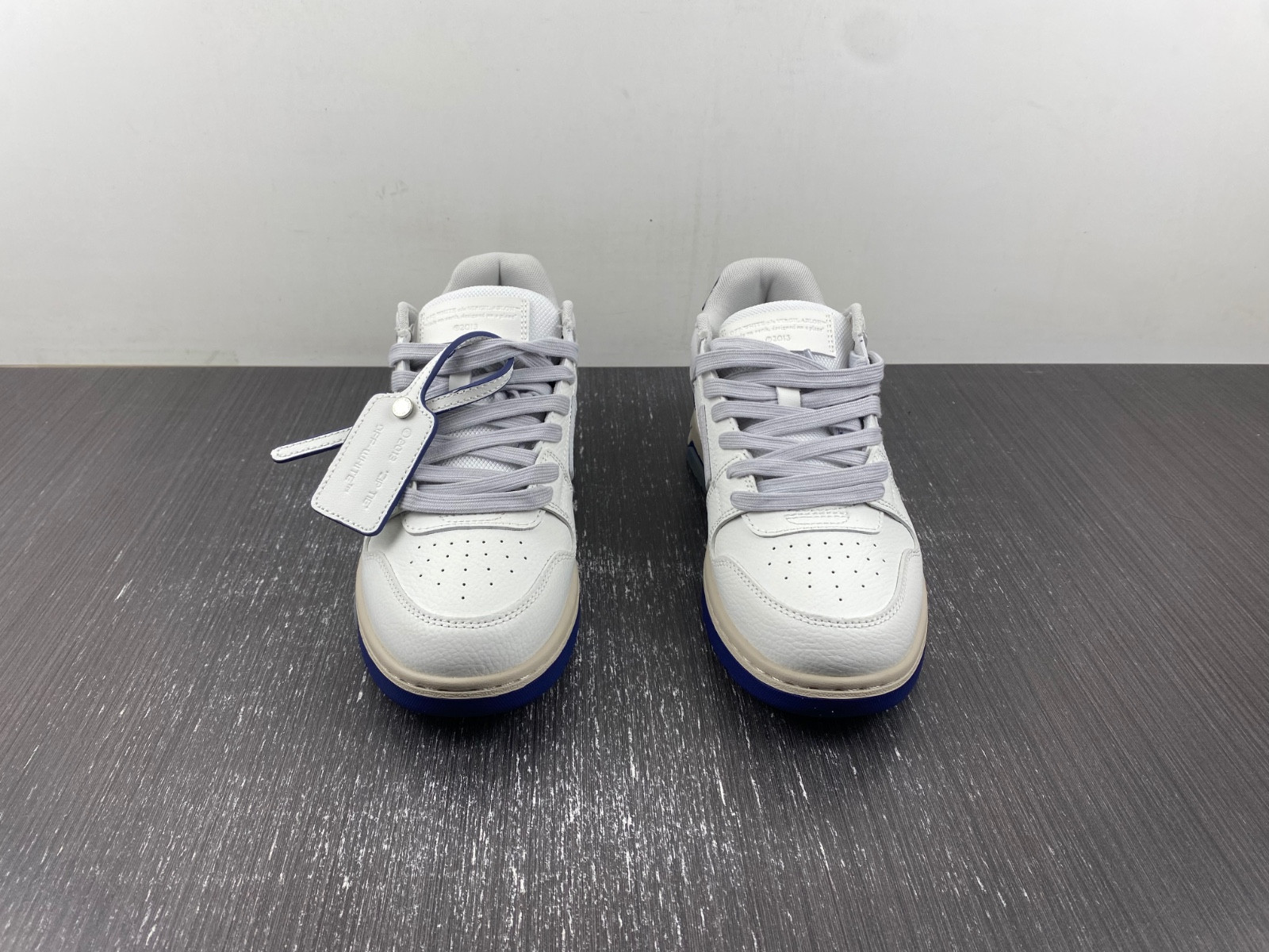 OF™ C/O VIRGIL ABLOH OUT OF OFFICE LOW-TOP LEATHER SNEAKERS ‘OOO“